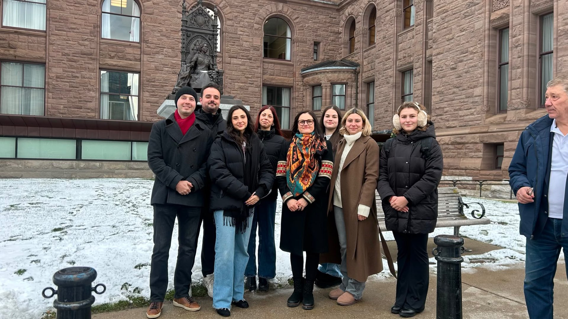 Community Group Photo — Queen's Park Courtyard